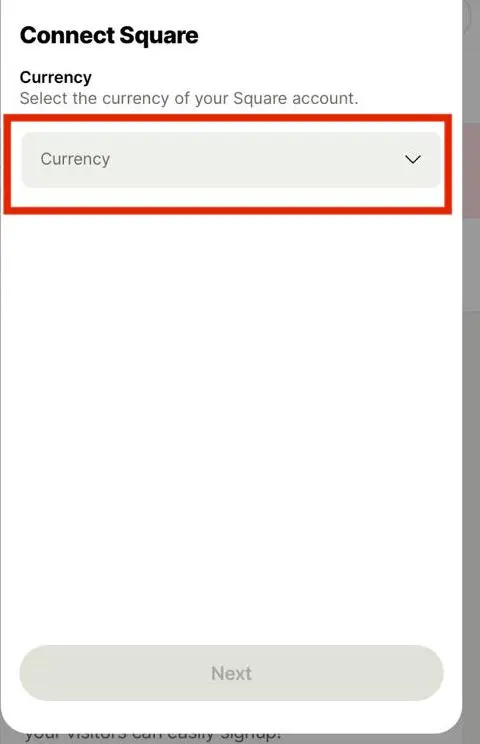 A screenshot of a displaying a dropdown menu labeled 'Select your currency' with a 'Next' button below it. Users can choose their preferred currency and move on to the next step in the setup process.